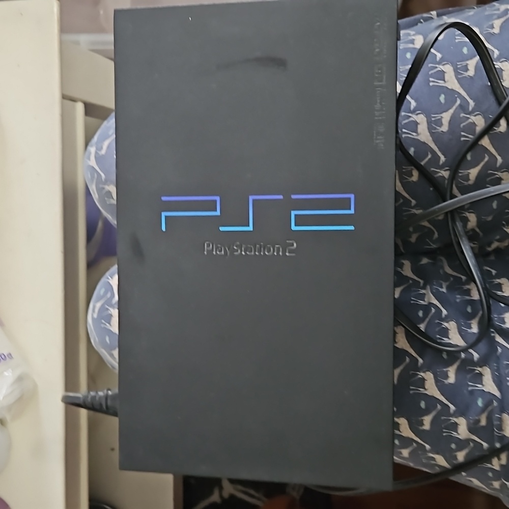 PS2 Console with Contoller and 2 Games